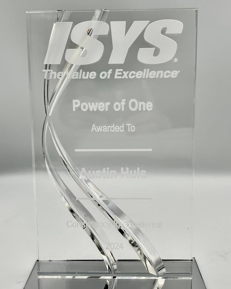 Custom acrylic award with chrome ribbon accent on mirrored base