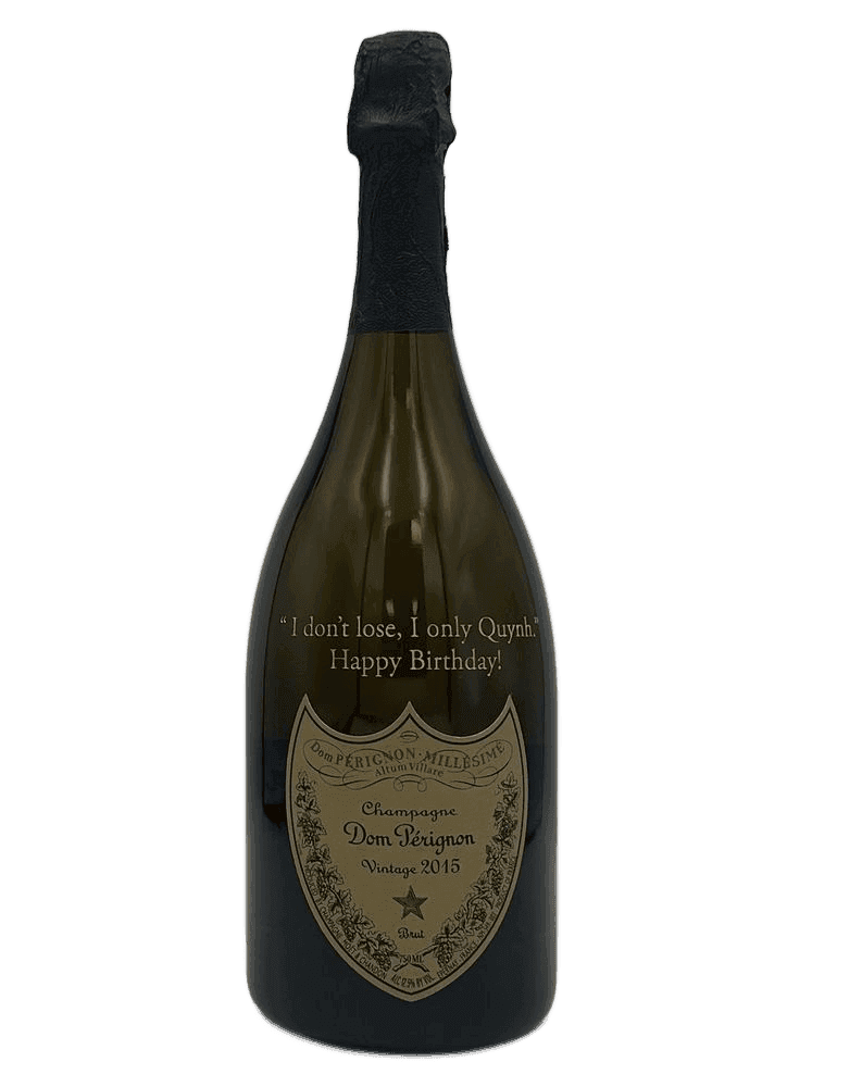 Dom Perignon champagne bottle with personalized engraving and gold paint fill