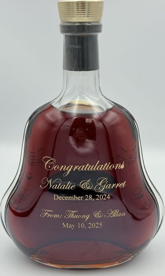 Hennessy XO cognac bottle with personalized gold engraving for a wedding gift